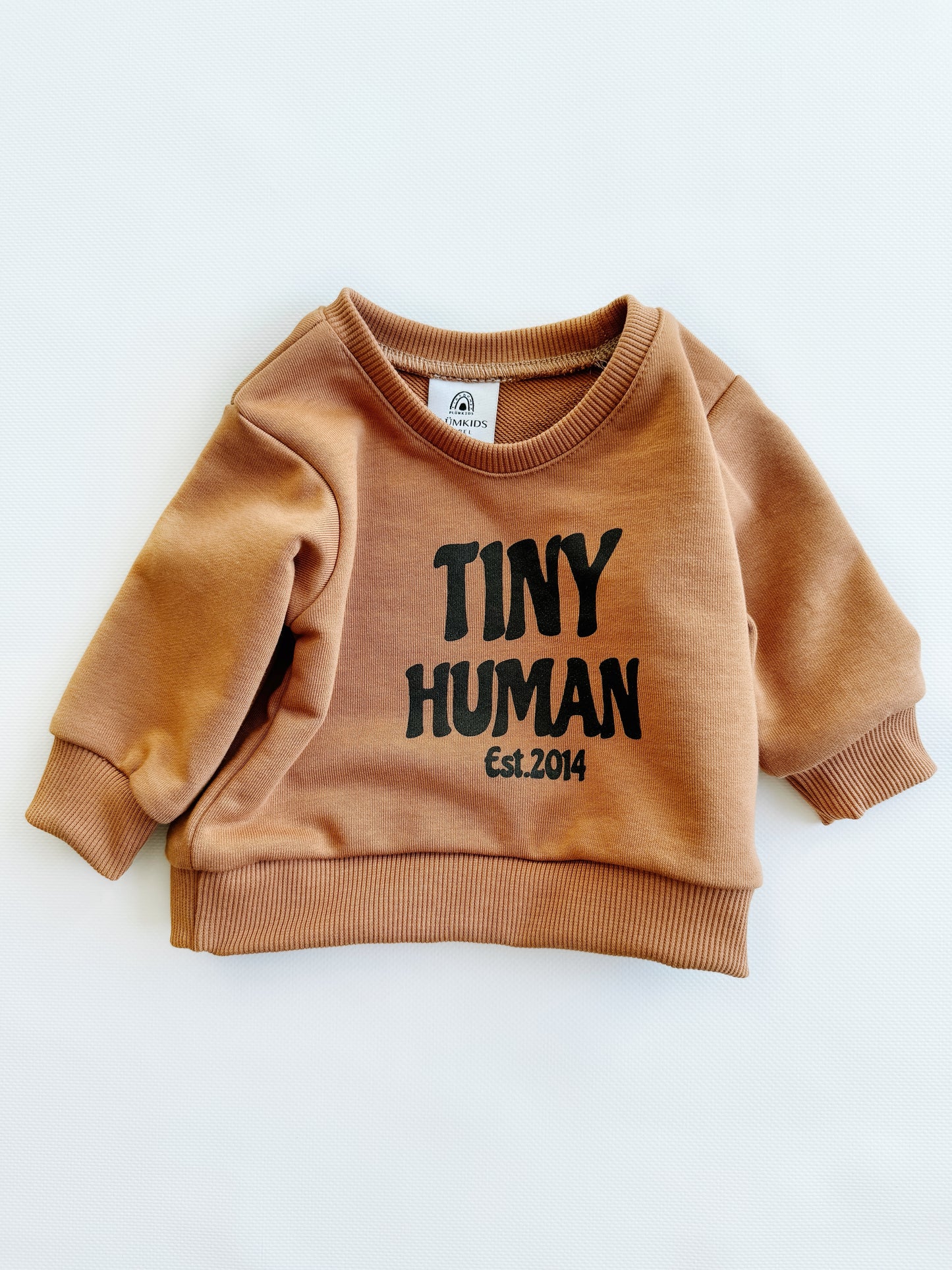 tiny human est.2014 | mocha