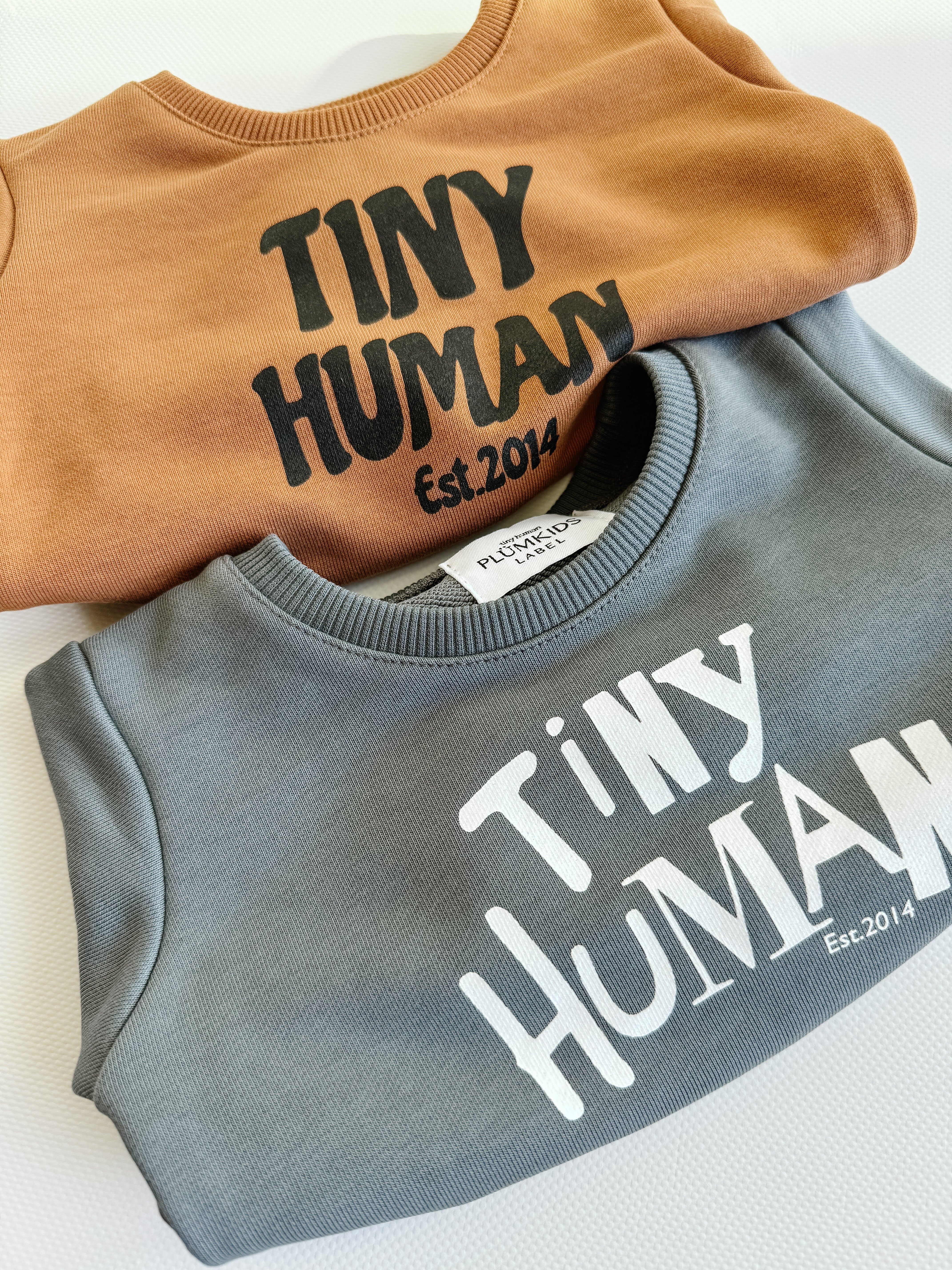 tiny human est.2014 | mocha