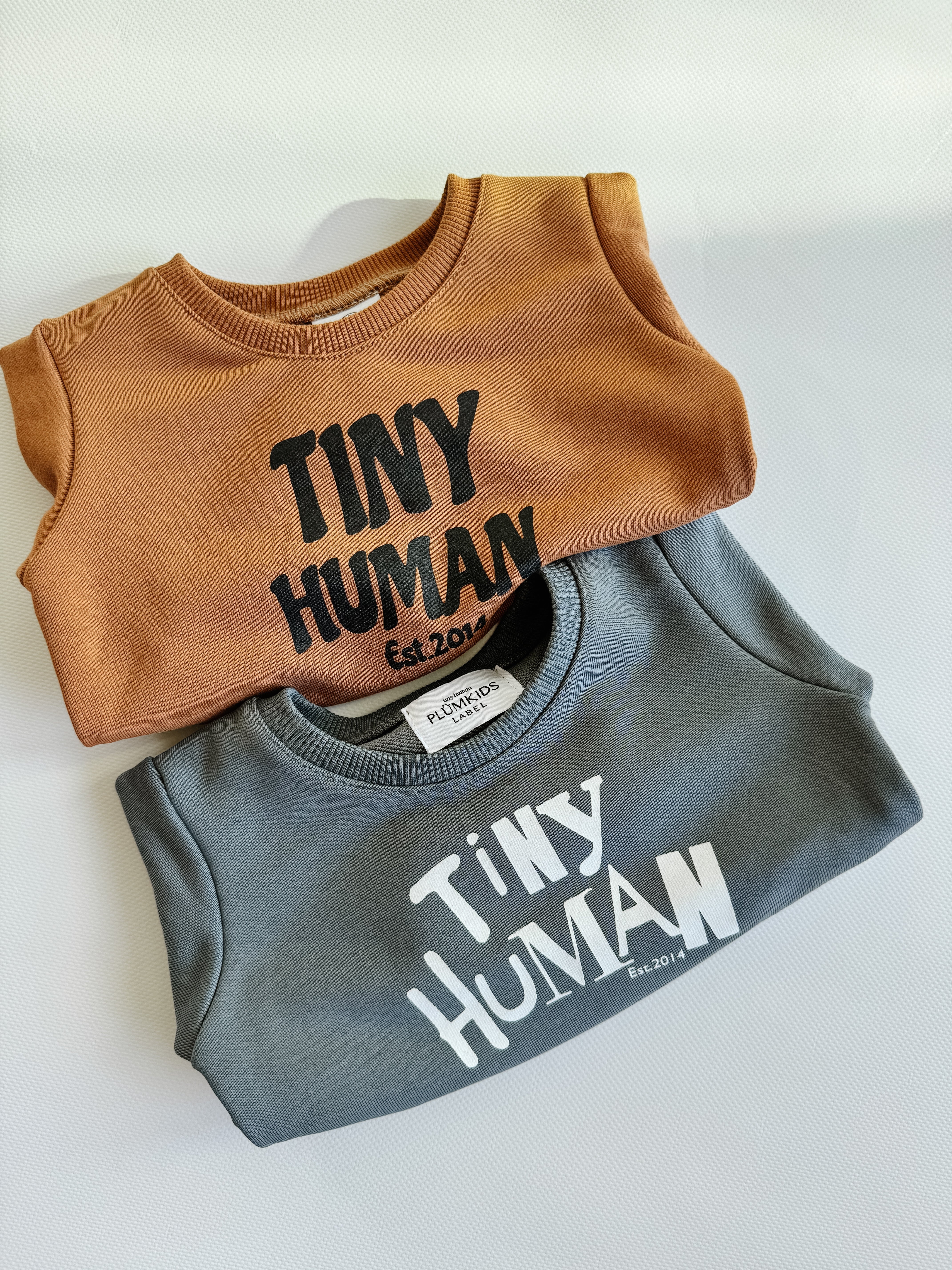 tiny human est.2014 | mocha