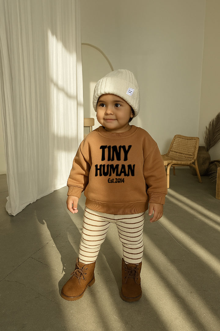 tiny human est.2014 | mocha